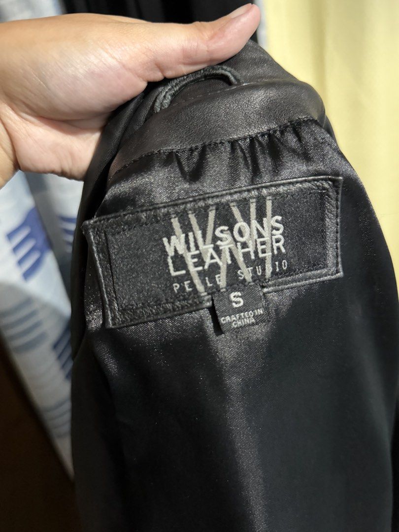 Wilsons Leather Studio Black Leather Jacket Size S (Category: Coats, Jackets and Outerwear) located in Quezon City. Submitted by m.angelaaa (Listing ID 1461101889, Image 3). Description: - Classic black leather jacket - Brand: Wilsons Leather Studio - Style: Button-up front, tailored fit - Perfect for cooler weather - Size: S - Origin: Crafted in China.