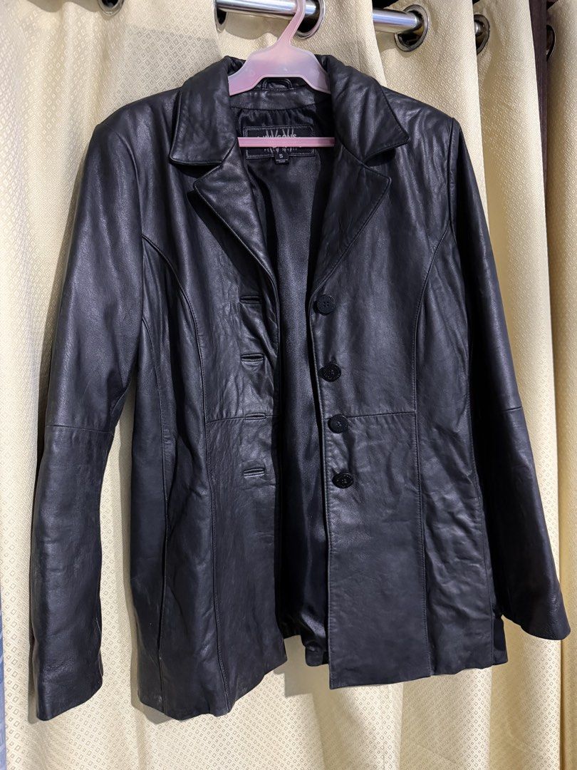 Wilsons Leather Studio Black Leather Jacket Size S (Category: Coats, Jackets and Outerwear) located in Quezon City. Submitted by m.angelaaa (Listing ID 1461101889, Image 1). Description: - Classic black leather jacket - Brand: Wilsons Leather Studio - Style: Button-up front, tailored fit - Perfect for cooler weather - Size: S - Origin: Crafted in China.