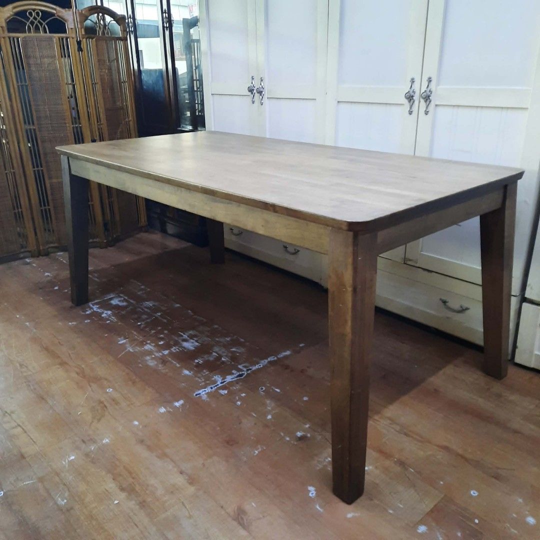 Wooden Dining Table (Category: Tables & Sets) located in Manila. Submitted by ivan_furnitures421 (Listing ID 1460926336, Image 2). Description: - Solid wooden dining table - Natural wood finish - Rectangular shape with four sturdy legs - Simple and classic design - Great for family meals or as a workspace - Measures approximately [insert length] x [insert width] x [insert height].