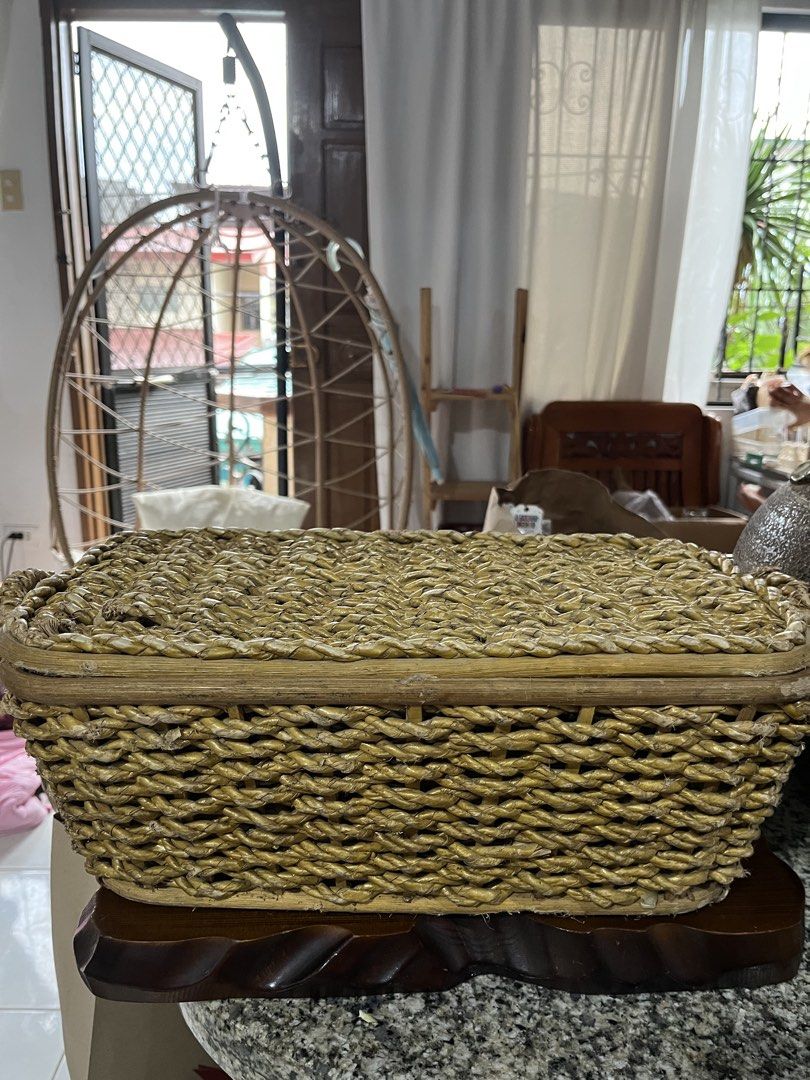 Sold—Woven Rectangular Basket with Lid (Category: Storage Boxes & Baskets) located in Taguig. Submitted by minmin_parker (Listing ID 1461009586, Image 1). Description: - Intricate woven rectangular basket with lid - Rustic, natural fiber look - Sturdy construction - Ideal for storage and display - Perfect for organizing or as a decorative piece.