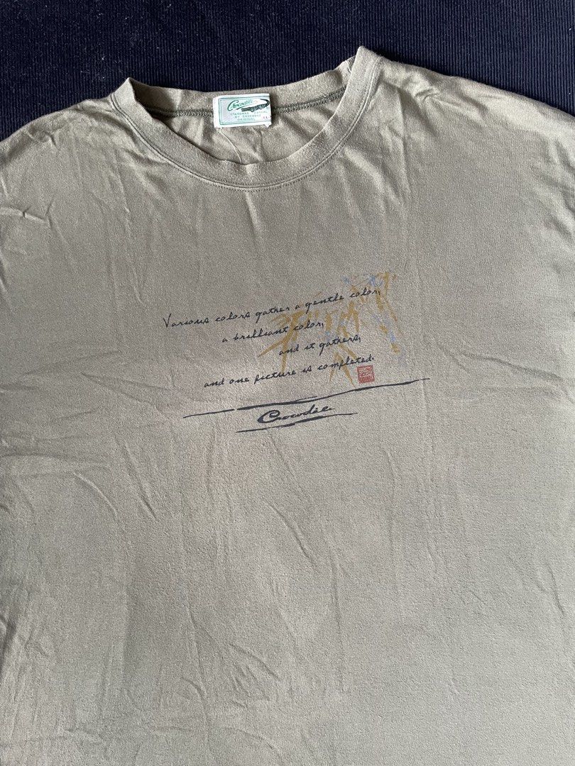 Y2K Crocodile Statement T-shirt (Category: Tshirts & Polo Shirts ) located in Naga. Submitted by curatedslips (Listing ID 1461027437, Image 2). Description: Y2K Crocodile Statement T-shirt 📏 Measurements: 23 x 27 📝 Condition: Good pre-owned condition ⚠️ Issue: Signs of usage.