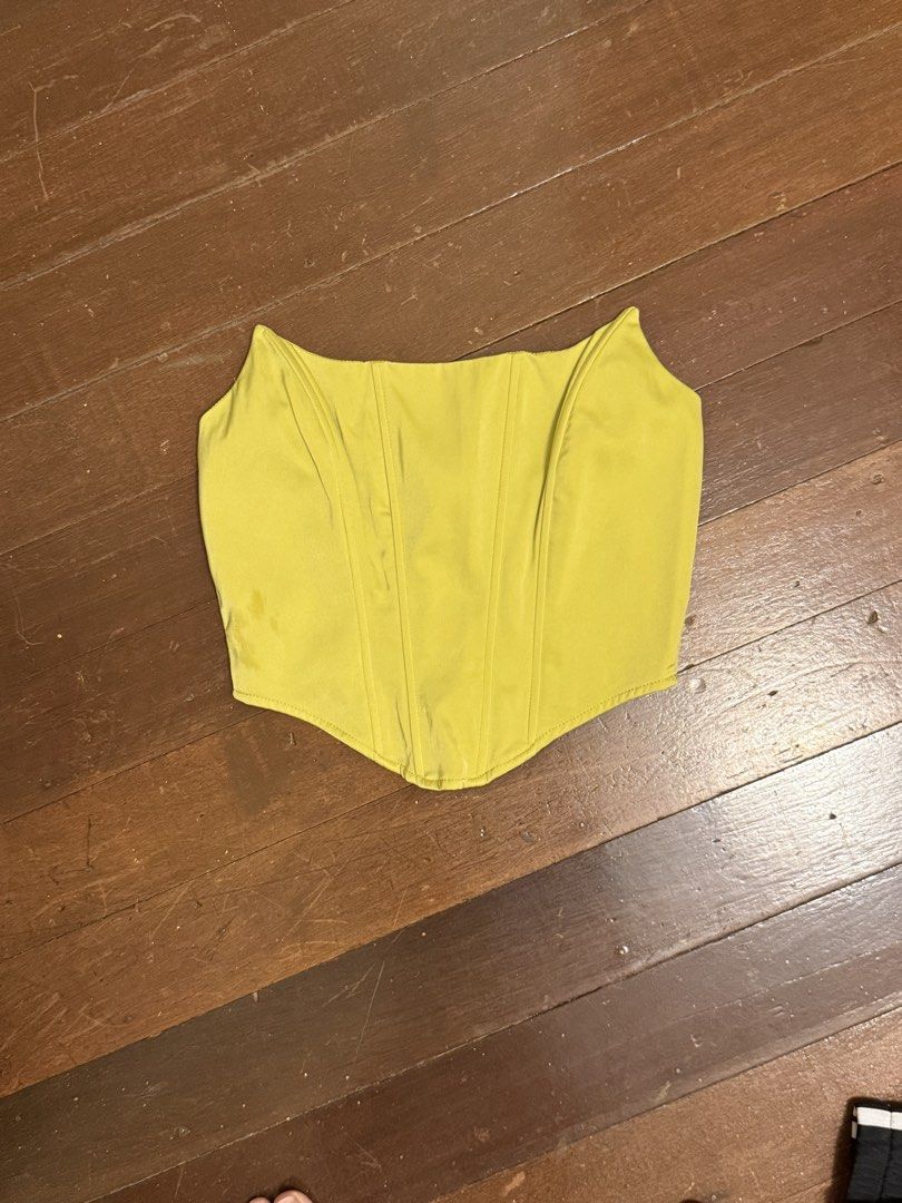 Yellow Corset Top with Zipper Back (Category: Others Tops) located in Angeles City. Submitted by lesmiz24601 (Listing ID 1460976502, Image 1). Description: - Trendy yellow corset top - Features a convenient back zipper closure - Fabric has a beautiful slight sheen - Best fits size Small to Medium - Versatile piece for dressing up or down.