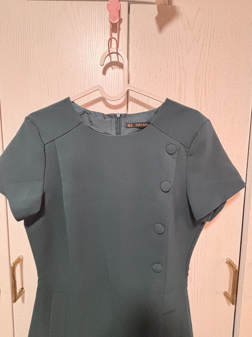 Zara Basic Dark Teal Button Detail Short Sleeve Dress Size M (Category: Dresses) located in Manila. Submitted by sophiadaphne (Listing ID 1460927503, Image 2). Description: - Zara Basic dark teal dress - Short sleeves with unique front button detail - Zipper closure at the back - Made in Turkey - Versatile for work or casual outings Shoulder to Hem: 34in Bust: up to 37in Waist: up to 31in.
