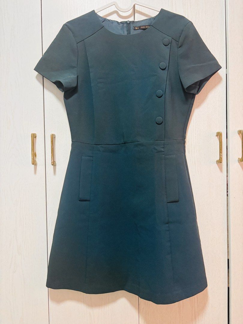Zara Basic Dark Teal Button Detail Short Sleeve Dress Size M (Category: Dresses) located in Manila. Submitted by sophiadaphne (Listing ID 1460927503, Image 1). Description: - Zara Basic dark teal dress - Short sleeves with unique front button detail - Zipper closure at the back - Made in Turkey - Versatile for work or casual outings Shoulder to Hem: 34in Bust: up to 37in Waist: up to 31in.