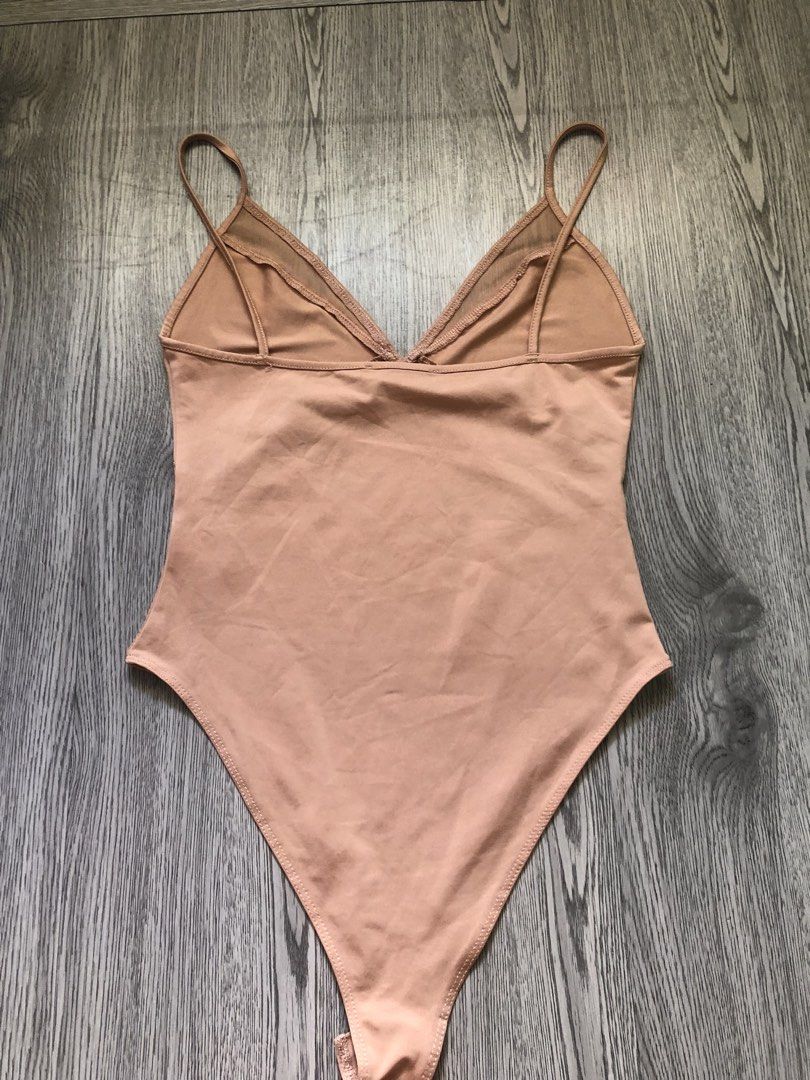 ZARA bodysuit (Category: Others Tops) located in Santa Rosa. Submitted by eceldg05 (Listing ID 1460930781, Image 2). Description: ZARA BODYSUIT SMALL on tag Fit xs to small NO PADSLOT LIKE NEW 📌FIX price.