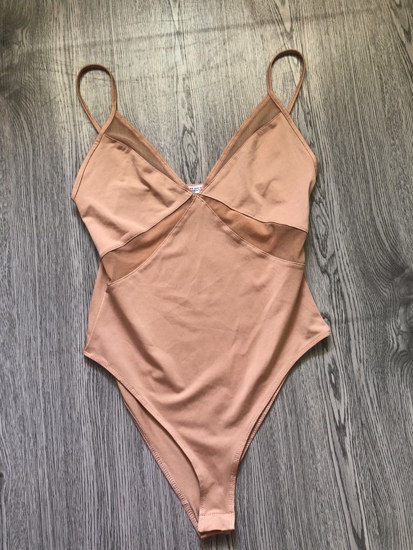 ZARA bodysuit (Category: Others Tops) located in Santa Rosa. Submitted by eceldg05 (Listing ID 1460930781, Image 1). Description: ZARA BODYSUIT SMALL on tag Fit xs to small NO PADSLOT LIKE NEW 📌FIX price.