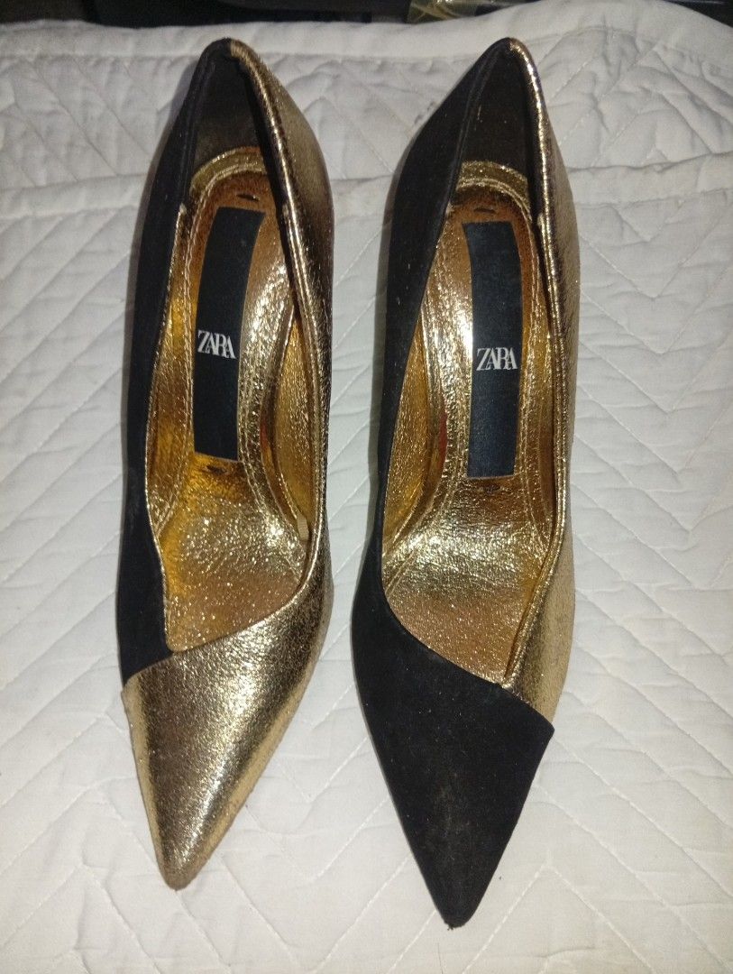 ZARA Gold and Black Pointed Toe Heels (Category: Heels) located in Davao. Submitted by lingxu23 (Listing ID 1460927964, Image 1). Description: - Brand: Zara - Color: Gold and Black - Style: Pointed Toe Heels - Size: 35 - Features: Gold inner sole with Zara logo, outer sole with Zara logo and size marking - Perfect for: Dressing up any outfit.