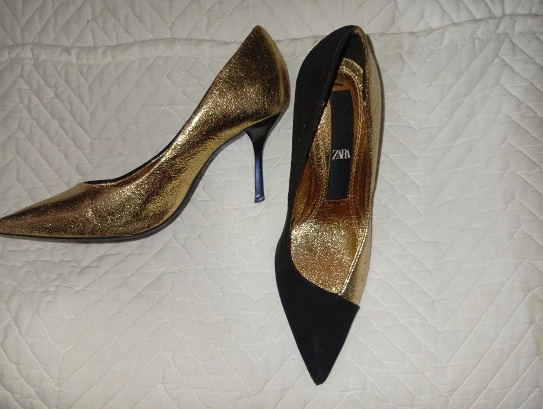 ZARA Gold and Black Pointed Toe Heels (Category: Heels) located in Davao. Submitted by lingxu23 (Listing ID 1460927964, Image 2). Description: - Brand: Zara - Color: Gold and Black - Style: Pointed Toe Heels - Size: 35 - Features: Gold inner sole with Zara logo, outer sole with Zara logo and size marking - Perfect for: Dressing up any outfit.
