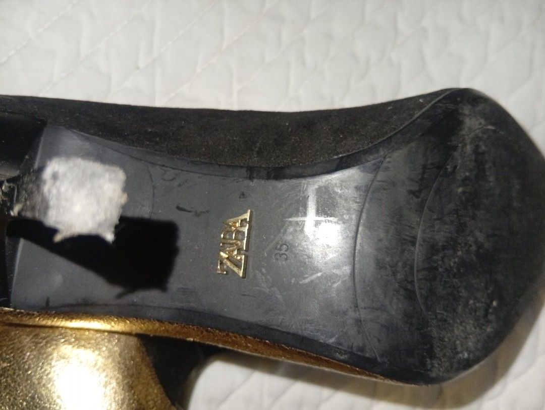 ZARA Gold and Black Pointed Toe Heels (Category: Heels) located in Davao. Submitted by lingxu23 (Listing ID 1460927964, Image 3). Description: - Brand: Zara - Color: Gold and Black - Style: Pointed Toe Heels - Size: 35 - Features: Gold inner sole with Zara logo, outer sole with Zara logo and size marking - Perfect for: Dressing up any outfit.