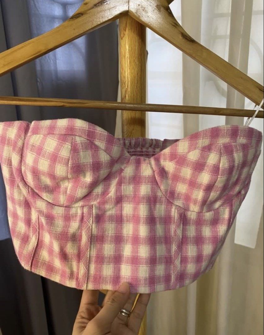 Zara Pink Gingham Corset Bustier Top (Category: Sleeveless) located in Lapu Lapu. Submitted by cecillia07 (Listing ID 1461035009, Image 1). Description: - Cute pink gingham corset top from Zara - Sweetheart neckline with structured cups - Smocked back for a comfy and adjustable fit - Versatile styling: pairs well with high-waisted jeans or skirts - Ideal for summer outings, parties, or a night out.