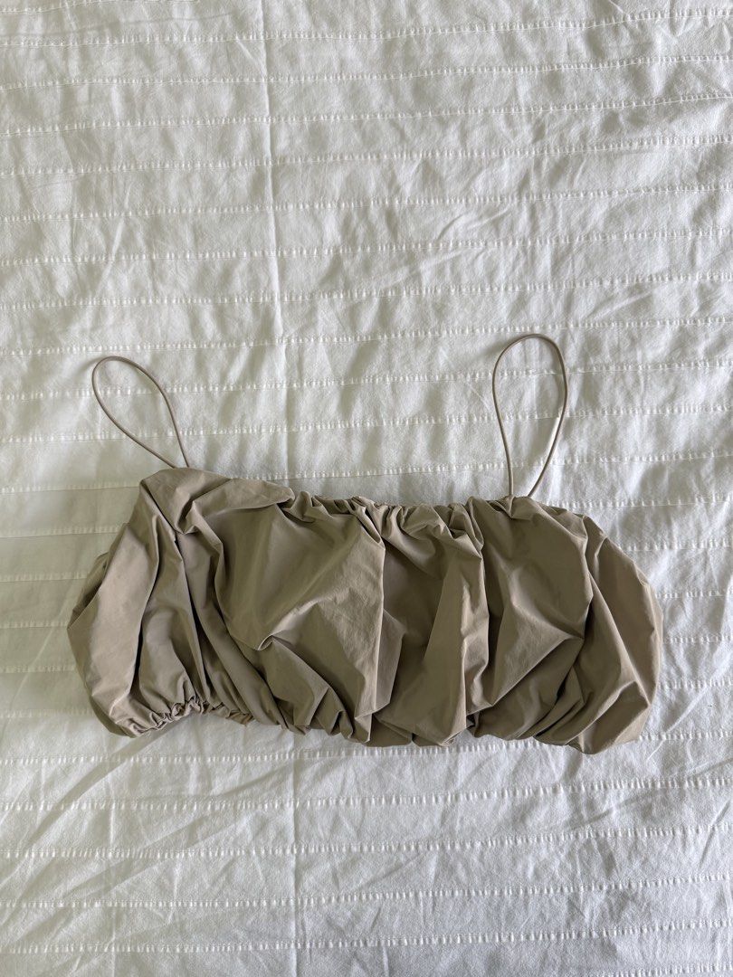 Zara Taupe Voluminous Crop Top (Category: Sleeveless) located in Tarlac. Submitted by samdeclutters_ (Listing ID 1461008680, Image 2). Description: - Size: S - Color: Taupe - Material: Nylon / Cotton - Features: Heavily crunched, bubble-hem silhouette with ultra-thin spaghetti straps - Used 2x.