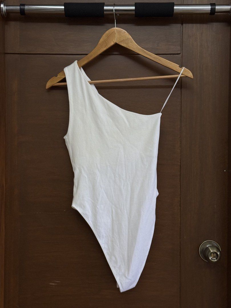 Zara White Cut-out One-Shoulder Bodysuit (Category: Sleeveless) located in Tarlac. Submitted by samdeclutters_ (Listing ID 1461006778, Image 2). Description: - Size: S - Features: Cut-out detail across the front chest area; standard snap-button closure - Never used, only washed once.