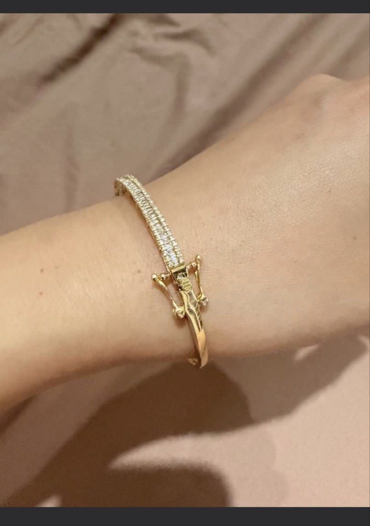 18k Gold Diamond Baguette Bangle Bracelet (Category: Bracelets) located in Quezon City. Submitted by mmauthenticshop (Listing ID 1461208733, Image 2). Description: Japan gold Baguette diamond 1 carat bangle With certificate 5.6 grams - Beautiful 18kgold bangle bracelet - Features sparkling baguette diamonds - Secure and easy-to-operate clasp - Adds a touch of luxury to any outfit - Versatile for dressing up or everyday sparkle - Approximately 7 i