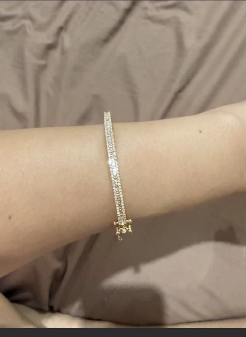 18k Gold Diamond Baguette Bangle Bracelet (Category: Bracelets) located in Quezon City. Submitted by mmauthenticshop (Listing ID 1461208733, Image 1). Description: Japan gold Baguette diamond 1 carat bangle With certificate 5.6 grams - Beautiful 18kgold bangle bracelet - Features sparkling baguette diamonds - Secure and easy-to-operate clasp - Adds a touch of luxury to any outfit - Versatile for dressing up or everyday sparkle - Approximately 7 i
