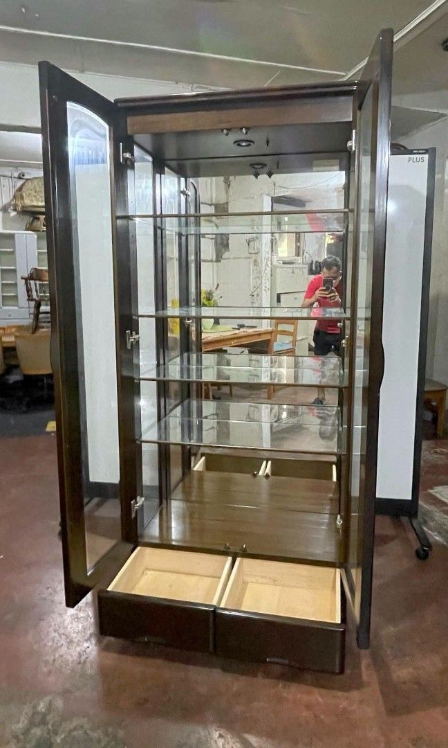 2 Door Full Glass Display Cabinet (Category: Shelves, Cabinets & Racks) located in Quezon City. Submitted by dannikkishoppe2 (Listing ID 1461229260, Image 3). Description: 2 Door Full Glass Display Cabinet ‼️₱16800‼️ Perfect for displaying your collections, dishes, décor, or other items. Elegant and practical for your home or business. Please manage your expectations as there might be minimal flaws. Color may vary due to lighting, it may appear d