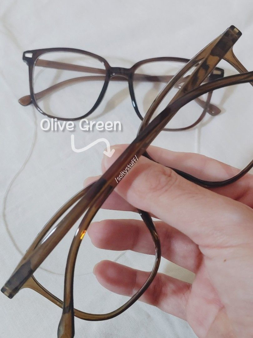 2 pcs. Glasses from Tiktok shop (Category: Sunglasses & Eyewear) located in Malolos. Submitted by soltyx (Listing ID 1461142961, Image 3). Description: price is for both used for affiliate video only unisex Color: Brown and Olive Green.