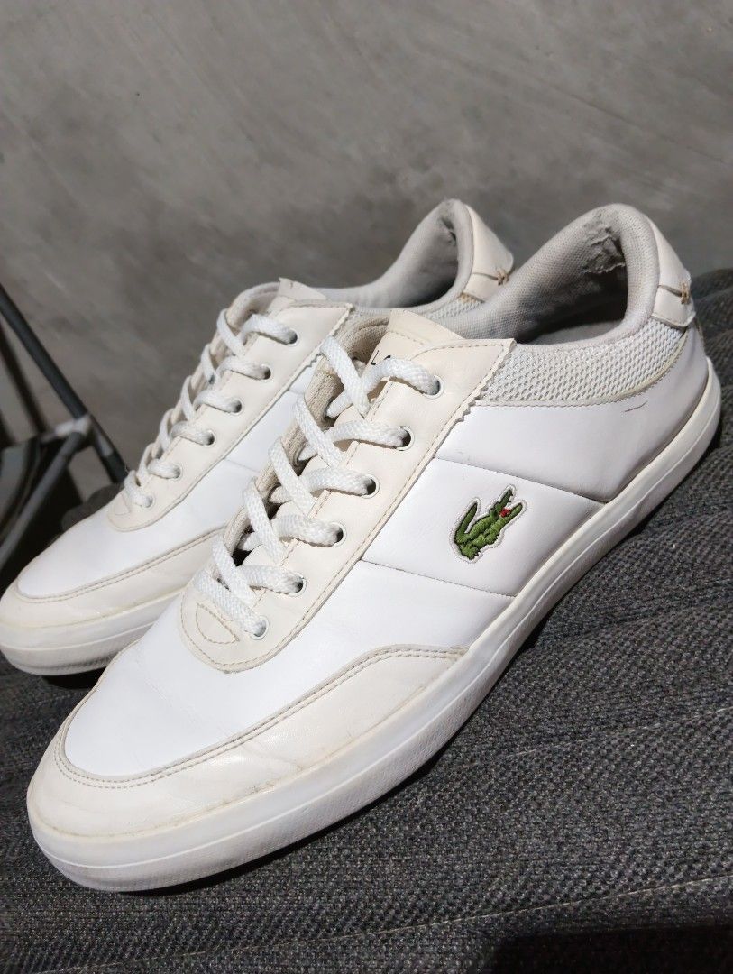 8 MEN Lacoste (Category: Sneakers) located in Cavite. Submitted by ronessabrandedshoes2ndaccount (Listing ID 1461228427, Image 3). Description: - White Lacoste sneakers - Iconic crocodile logo on the side - Secure lace-up closure - Perfect for everyday casual wear.