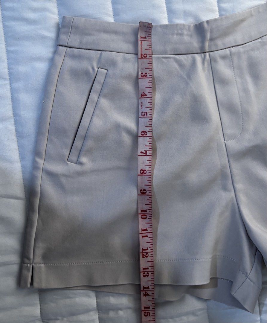 ✨ IORA Tailored Beige High-Waisted Shorts (Category: Shorts) located in Manila. Submitted by hellothere2012 (Listing ID 1461323065, Image 3). Description: Minimalist and classy beige shorts from IORA, featuring a structured tailored cut, front pleats, slanted side pockets, and a neat waistband. Perfect for office outfits, smart casual looks, or elevated everyday styling. 📌 Details: * Brand: IORA * Size: M (EUR 38 / UK 10) * Color: Beige / Nude *