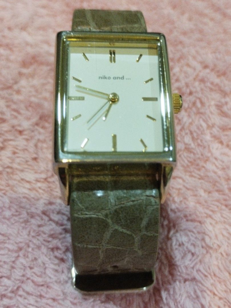 ✨ Niko And.. Tank watch (Category: Women's Watches) located in Santa Rosa. Submitted by leShoppe (Listing ID 1461237682, Image 1). Description: 🗝️hair lines on the back of strap.