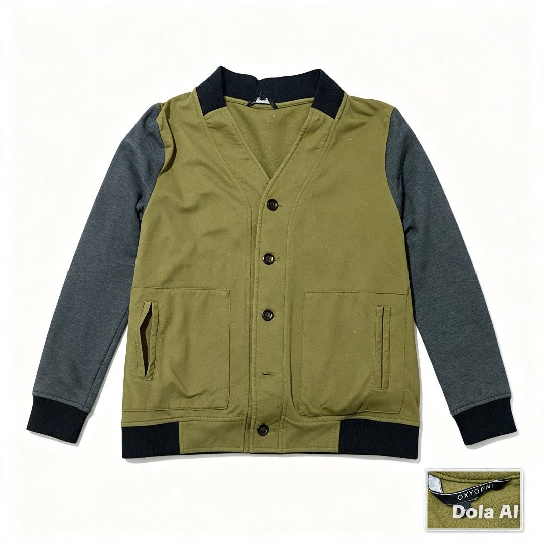 🧥 OXYGEN Olive Mixed-Media Jacket (Category: Coats, Jackets and Outerwear) located in Paranaque City. Submitted by gentle.declutter (Listing ID 1461219796, Image 1). Description: Brand: OXYGEN — trusted local premium brand Size: L / Large Style: Unique mixed-design → olive soft-touch front panel + heather gray long sleeves + black ribbed collar & hem Details: Button-front closure, 2 front patch pockets with side-entry openings, soft fleece-like 