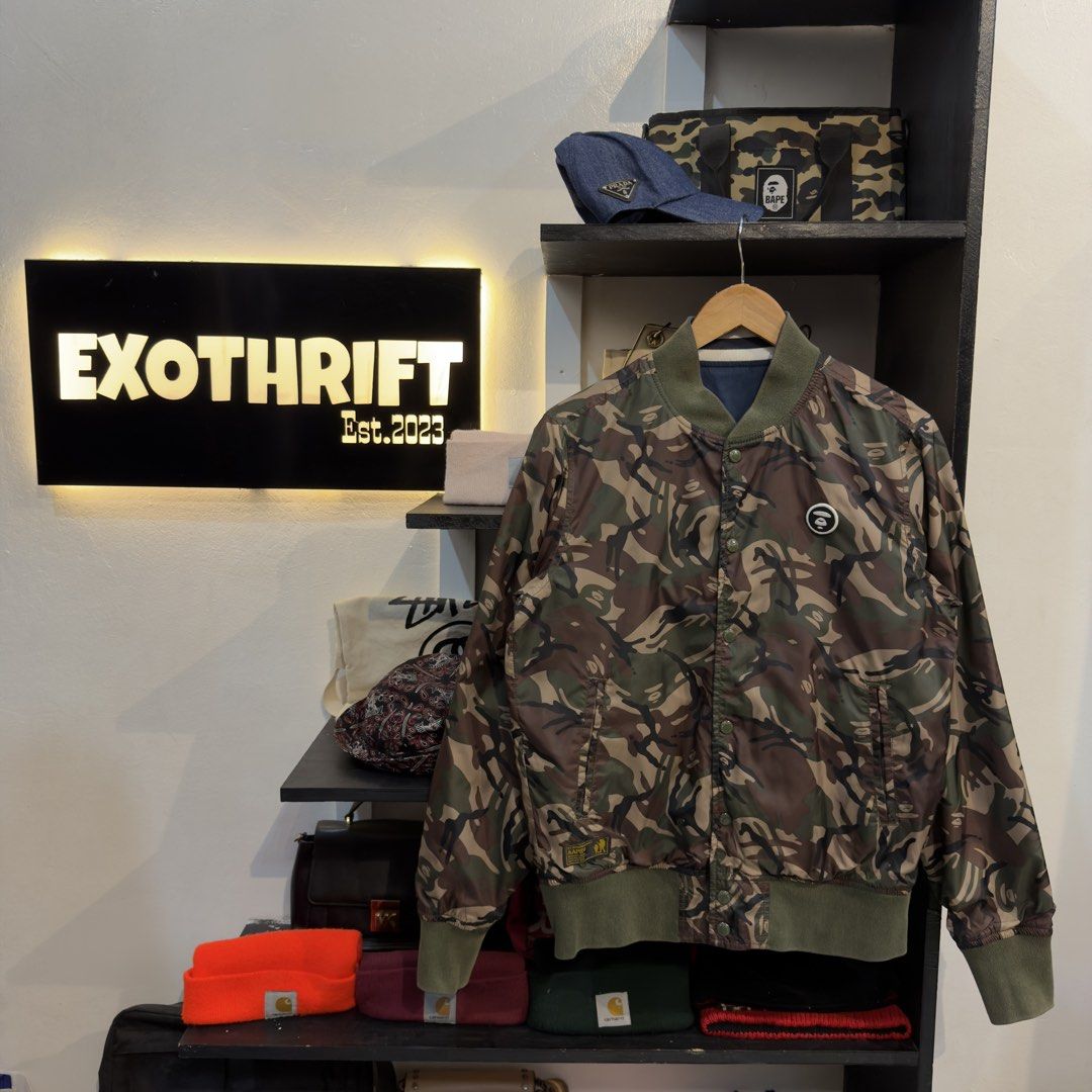 Aape Camo Reversible Varsity Jacket (Category: Coats, Jackets and Outerwear) located in Manila. Submitted by jerichomal82553 (Listing ID 1461282038, Image 1). Description: Aape Camo Varsity Jacket 20.5 by 26 Good Condition Complete Tags.