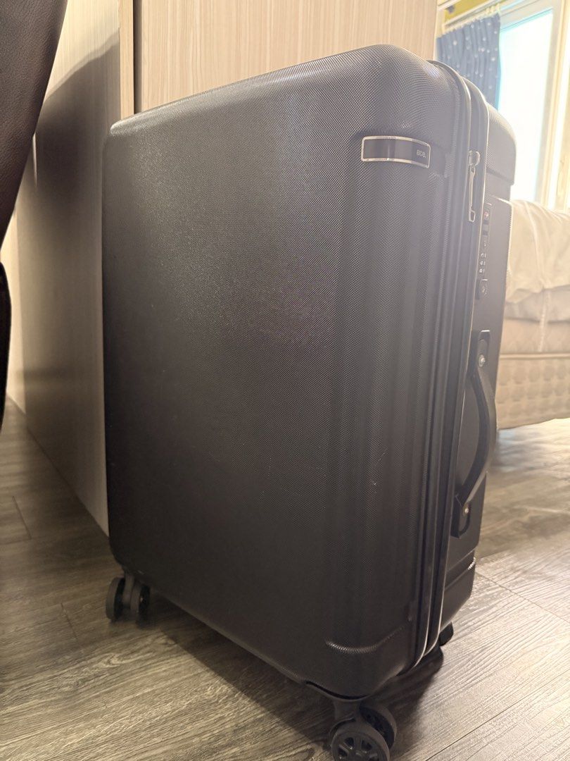 Ace Black Hardshell Spinner Luggage with TSA Lock (Category: Luggage) located in Taguig. Submitted by _annaq_ (Listing ID 1461139970, Image 2). Description: - ACE brand, made in Japan - black hardshell luggage - Features a TSA combination lock for security - Smooth rolling spinner wheels for easy maneuverability - Interior with mesh compartments for organization - Zippers are intact and functional - Handle extends and retracts properly - Great fo