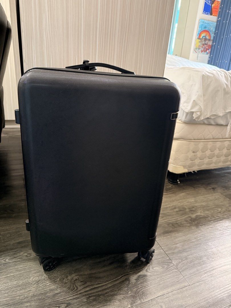 Ace Black Hardshell Spinner Luggage with TSA Lock (Category: Luggage) located in Taguig. Submitted by _annaq_ (Listing ID 1461139970, Image 1). Description: - ACE brand, made in Japan - black hardshell luggage - Features a TSA combination lock for security - Smooth rolling spinner wheels for easy maneuverability - Interior with mesh compartments for organization - Zippers are intact and functional - Handle extends and retracts properly - Great fo