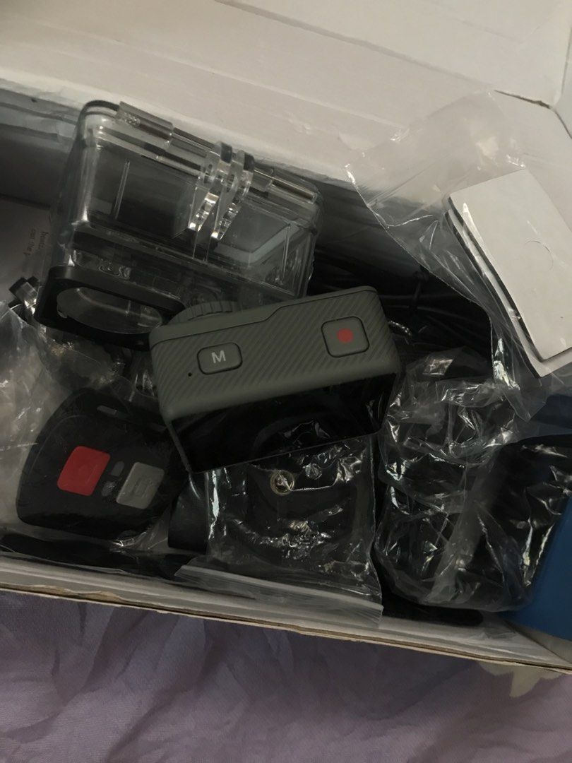 Action Camera with Complete Accessories (Category: Cameras) located in Tuguegarao City. Submitted by prettylexi (Listing ID 1461167987, Image 3). Description: - Shoots in stunning 5K resolution - Comes with waterproof housing for underwater adventures - Includes remote control for easy operation - Packed with various mounts and accessories - All original packaging included - Ideal for capturing your adventures - Para Sa mga mahilig maghike and be