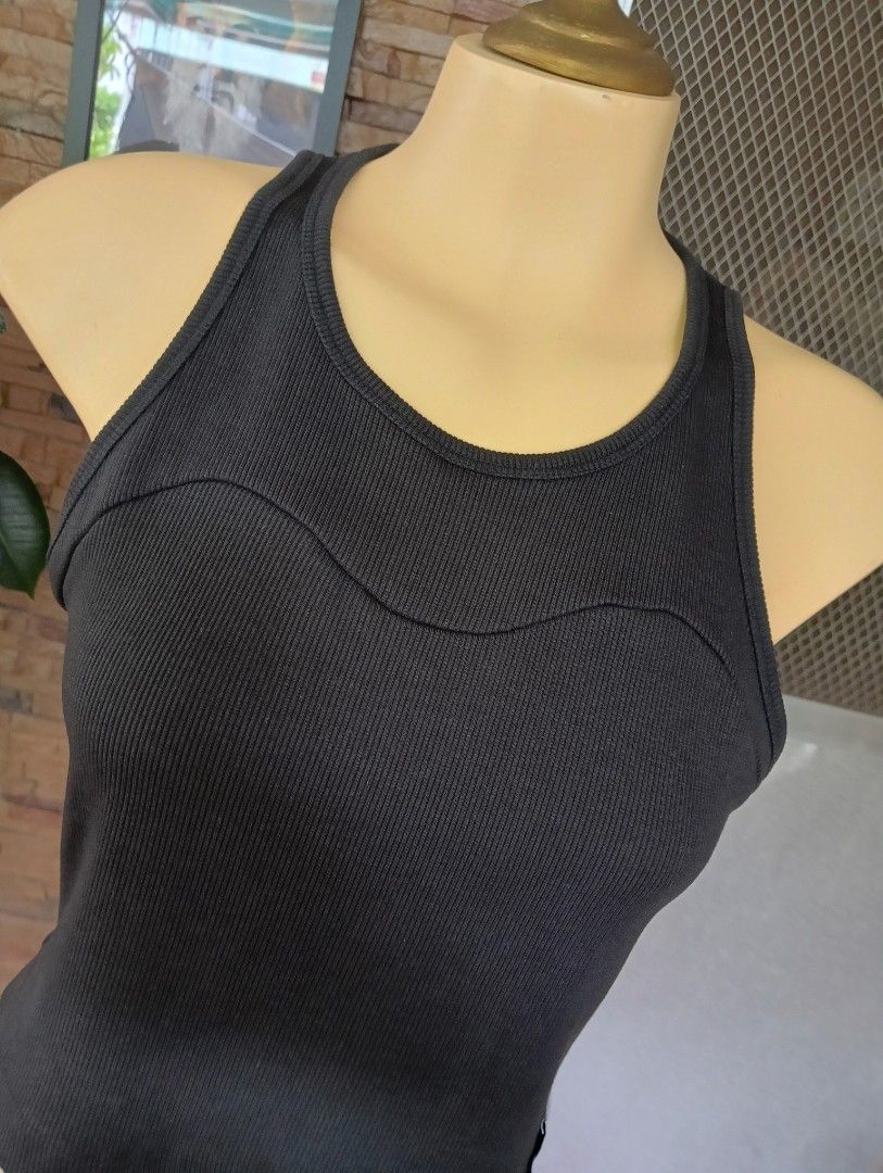 Adidas (Category: Activewear) located in Rizal. Submitted by timeless_shop (Listing ID 1461169182, Image 3). Description: 🔥 ORIGINAL Adidas Crop Tank - Black 📏 Length: 17 inches 📐 Width: 15 inches flat laid 👚 Bust Fit: 32- 34 inches 👖 Fit: Small to Medium Frame 💯 Condition: 9/10 - Like New Almost! ✨ 🎨 Color Rate: 9/10 - Black na black, hindi kupas! ✨ Maayos at malinis din 🧵 TELA: - Stretchable, makapal pero presko - Crop top cut, pang-gym