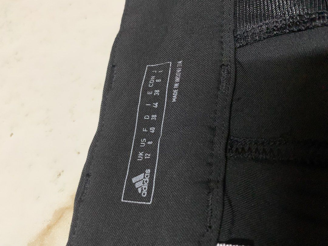 Adidas Black Athletic Shorts Men's (Category: Shorts) located in Iloilo. Submitted by johnpullan30303 (Listing ID 1461267406, Image 2). Description: - Black Adidas shorts - Size 38 waist - Made in Indonesia - Ideal for sports or casual wear - Features pockets - Clean and simple design.