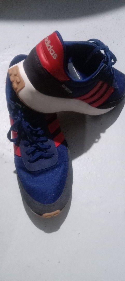 Adidas Blue and Red Sneakers (Category: Sneakers) located in Marikina City. Submitted by elenablinknini (Listing ID 1461320048, Image 1). Description: - Adidas sneakers in blue with red accents - Classic three stripes design - Lace-up closure for a secure fit - Durable rubber sole no flaws - Great for casual wear or light sports - Shows some signs of wear but still has plenty of life left.
