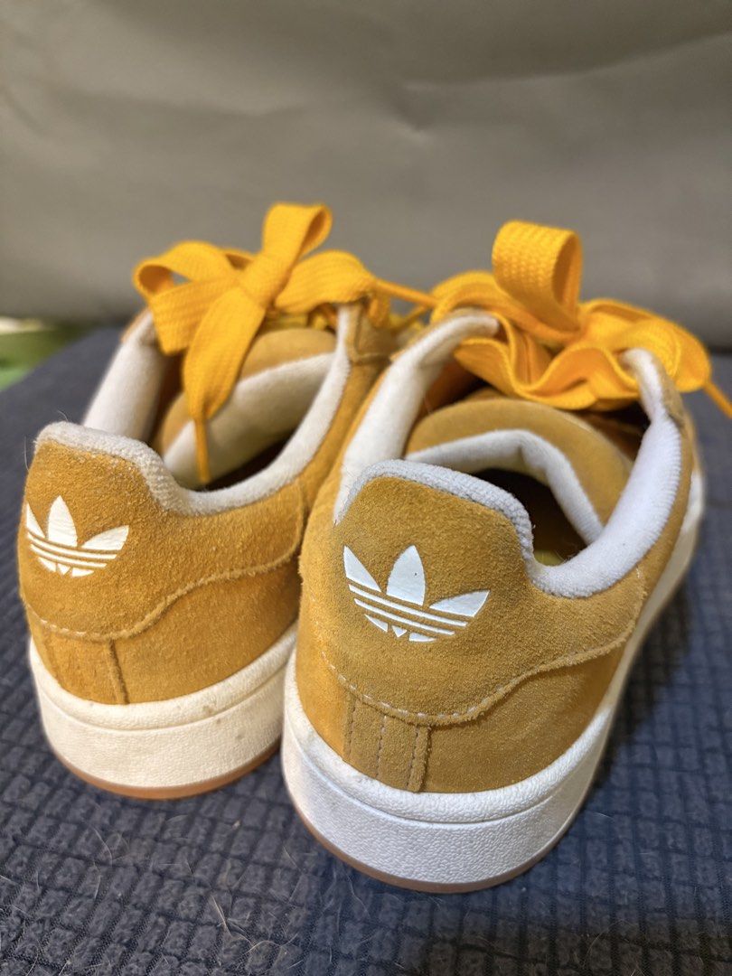 Adidas Campus Yellow Suede Sneakers (Category: Sneakers) located in Quezon City. Submitted by keimanalad (Listing ID 1461189301, Image 3). Description: - Yellow Adidas Campus sneakers - Suede material with iconic white stripes - Classic lace-up closure - Comes with white shoe lace - Durable gum sole - Made in Vietnam - Size: 5 US Women’s (Pero I’m size 7 kasya sakin-24.5cm ako) rfs: Decluttering No box Loc: Taguig No meet ups Courier will be shou
