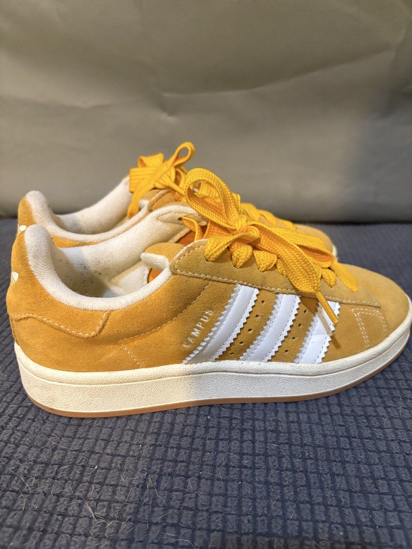 Adidas Campus Yellow Suede Sneakers (Category: Sneakers) located in Quezon City. Submitted by keimanalad (Listing ID 1461189301, Image 2). Description: - Yellow Adidas Campus sneakers - Suede material with iconic white stripes - Classic lace-up closure - Comes with white shoe lace - Durable gum sole - Made in Vietnam - Size: 5 US Women’s (Pero I’m size 7 kasya sakin-24.5cm ako) rfs: Decluttering No box Loc: Taguig No meet ups Courier will be shou