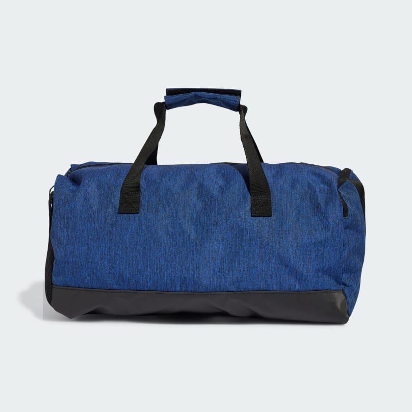 Adidas Duffel Bag Small Blue (Category: Sling Bags) located in Mabalacat. Submitted by frannnn (Listing ID 1461309132, Image 3). Description: - Adidas small duffel bag - Blue heathered fabric with black accents - Iconic three stripes at the bottom - Main compartment - Handles for carrying - Ideal for gym sessions or short getaways -Dimensions: 20 cm x 45.5 cm x 23 cm -Volume: 24 L.