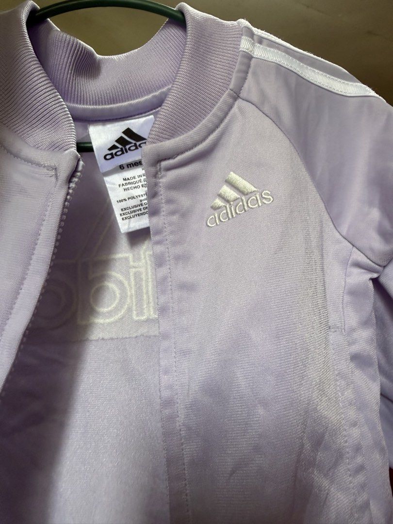 Adidas lavender baby jacket (Category: Babies & Kids Fashion) located in Baguio. Submitted by streasurechest (Listing ID 1461143248, Image 3). Description: Good as new po eto Like brandnew and condition at tela No flaws Used isang beses lang 6months on tag Lavender ang kulay in actual Baguio city location.