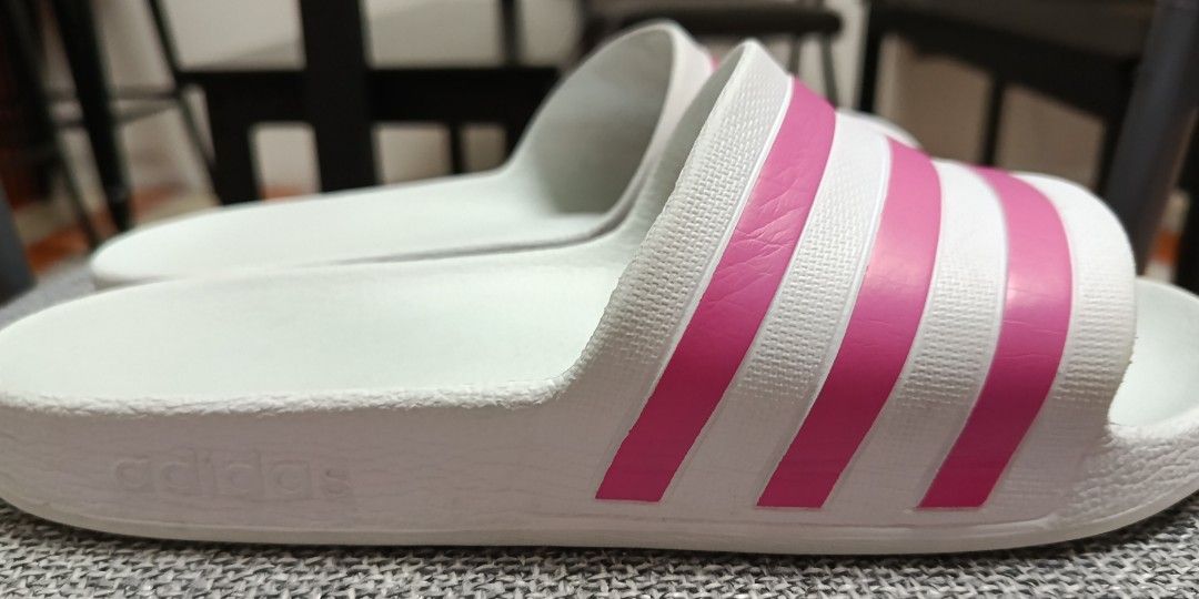 Adidas slides (Category: Slippers and slides) located in Quezon City. Submitted by brand_dyn3 (Listing ID 1461261659, Image 3). Description: Adidas Slides this item is used pero I still have one more same size, same color and design brand new/not used. this was bought in America 🇺🇸.