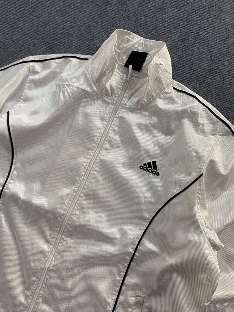Adidas windbreaker y2k (Category: Coats, Jackets and Outerwear) located in Manila. Submitted by j4y_thrift (Listing ID 1461192806, Image 3). Description: Note: Color may due to lightning conditions please please manage your expectations since item are used.