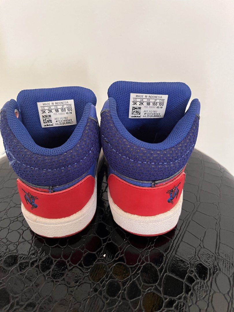 Adidas x Marvel Spiderman High-Top Sneakers (Category: Babies & Kids Fashion) located in Manila. Submitted by ezekielco18646 (Listing ID 1461249127, Image 2). Description: - Cute blue Adidas high-tops - Features Spiderman details - Perfect for Marvel fans - Easy velcro straps for quick on/off - Size: 3K - Made in Indonesia -used only for pictorial purposes.