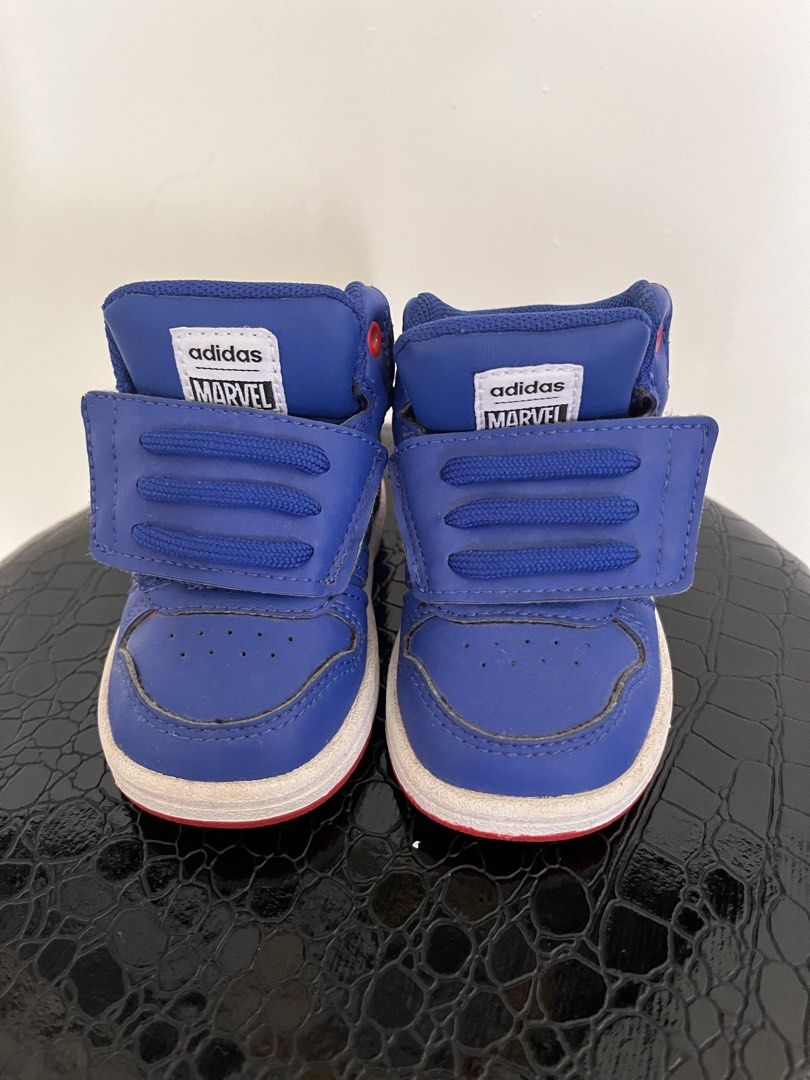 Adidas x Marvel Spiderman High-Top Sneakers (Category: Babies & Kids Fashion) located in Manila. Submitted by ezekielco18646 (Listing ID 1461249127, Image 1). Description: - Cute blue Adidas high-tops - Features Spiderman details - Perfect for Marvel fans - Easy velcro straps for quick on/off - Size: 3K - Made in Indonesia -used only for pictorial purposes.
