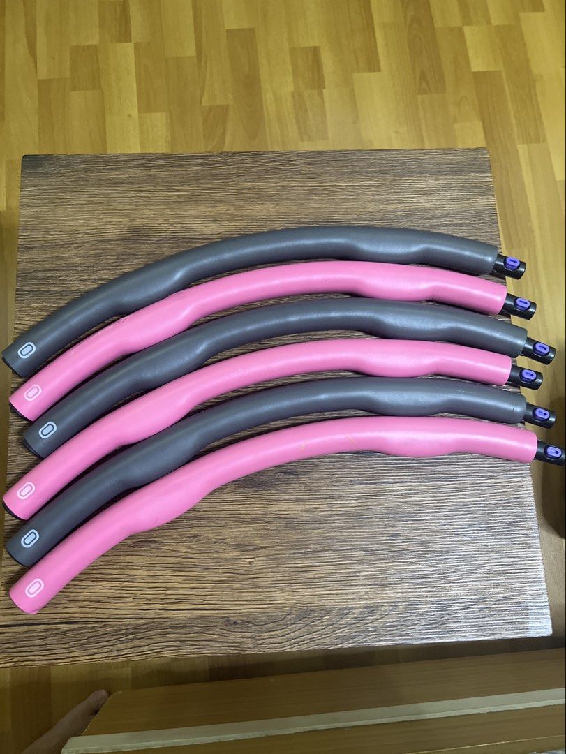 Adjustable Weighted Hula Hoop Set (Category: Toning & Stretching Accessories) located in Quezon City. Submitted by lucky876 (Listing ID 1461242816, Image 1). Description: - Set of 6 hula hoop sections - Pink and grey colors - Connects to form a full hoop - Adjustable size (use fewer sections) - Ideal for fitness and exercise routines - Simple to assemble and take apart.