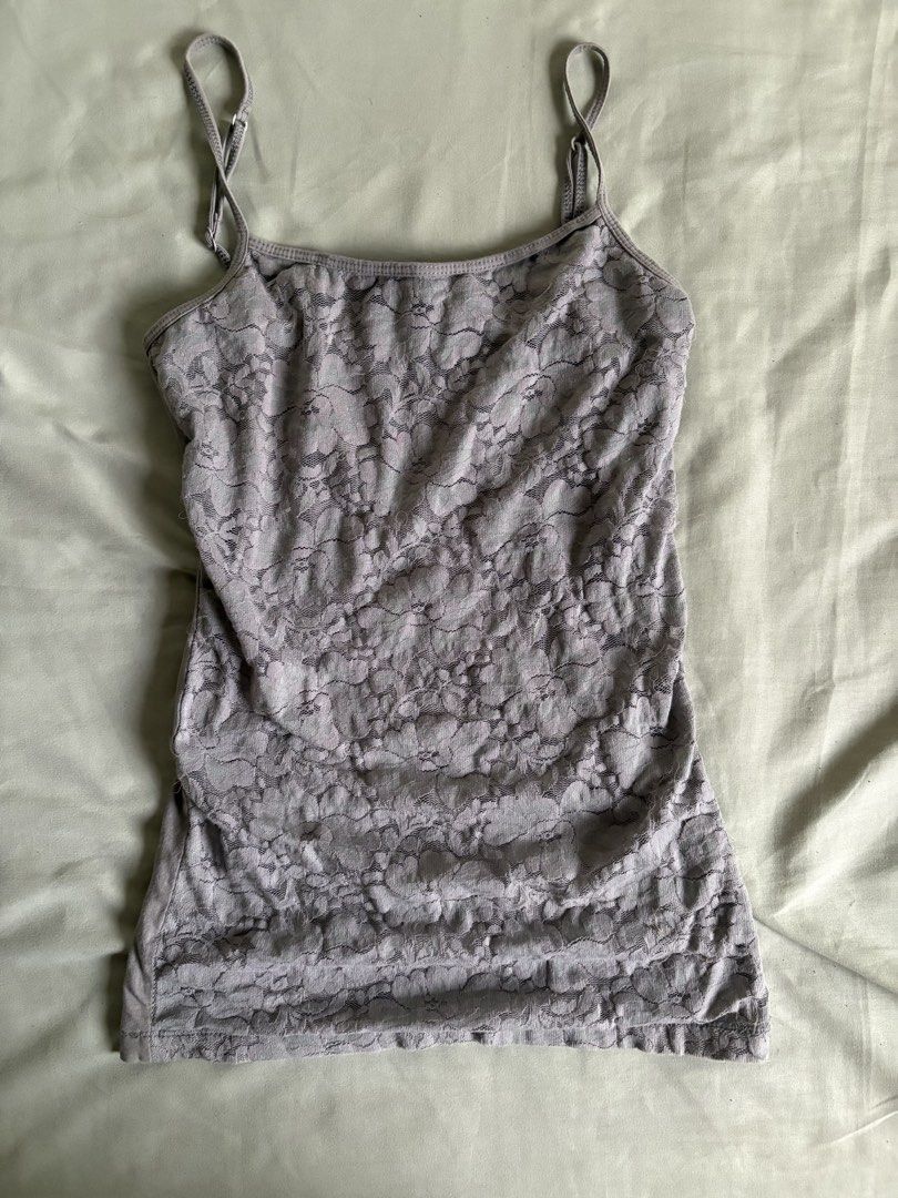 Aeropostale Grey Lace Cami Top S/P (Category: Sleeveless) located in Legazpi City. Submitted by satowa00 (Listing ID 1461269332, Image 1). Description: - Grey Aeropostale cami top - Features a delicate lace overlay - Adjustable straps for a perfect fit - Size: S/P (Small/Petite) - Made in Guatemala - Versatile: great for layering or wearing on its own.