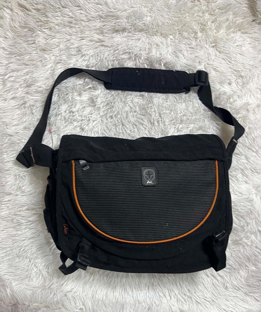 Aesics Messenger Bag (Category: Sling Bags) located in Manila. Submitted by senggggg. (Listing ID 1461300437, Image 1). Description: good condition working zip need wash minimal sign of use fade tag authentic.