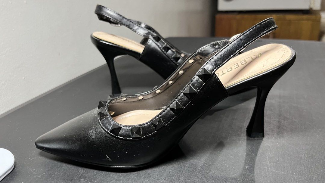 ALBERTO Black Studded Slingback Heels (Category: Heels) located in Quezon City. Submitted by moms_closet_0306 (Listing ID 1461188774, Image 2). Description: - Brand: ALBERTO - Style: Black Slingback Heels - Toe: Pointed with stud detailing - Closure: Buckle strap at ankle - Heel: Unique flared shape - Occasion: Dress up any outfit Used only once at a wedding last June 2026 Like new (used only once in a wedding last June 2026).