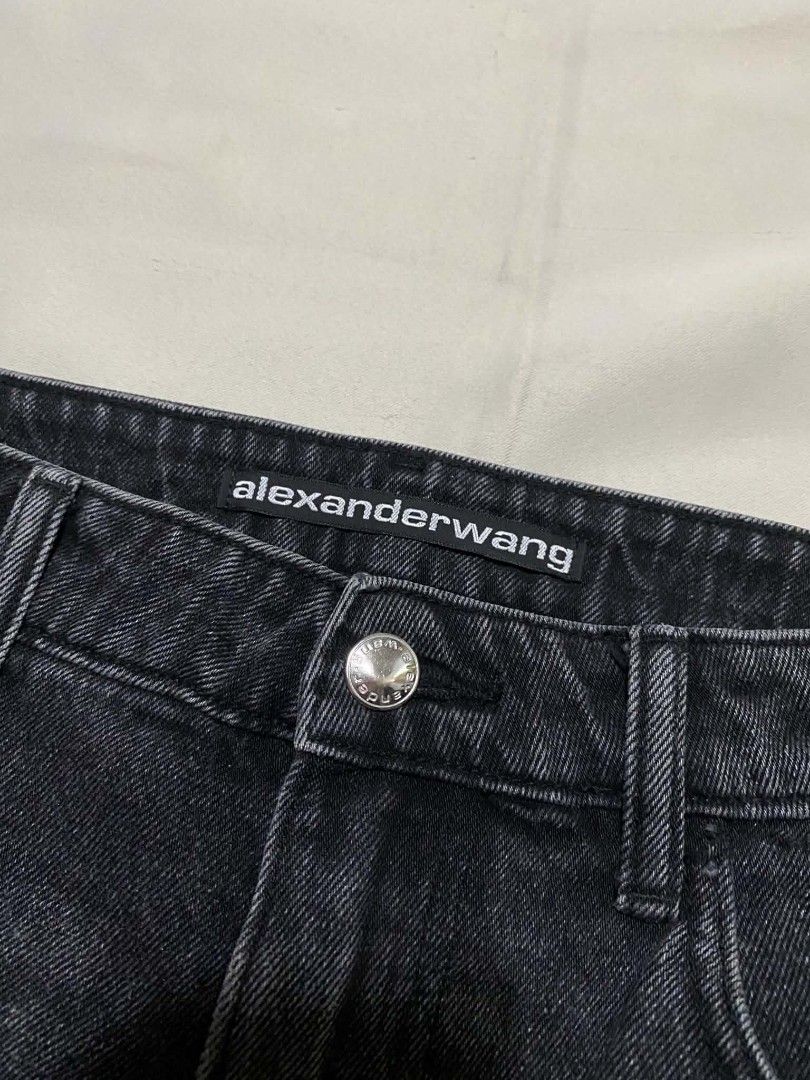 Alexander Wang Denim Shorts sz28 (Category: Shorts) located in Taguig. Submitted by althriftdailyloots94 (Listing ID 1461263047, Image 2). Description: - Brand: Alexander Wang size 28 - Color: Black - Style: High-rise denim shorts - Features: Distressed hemline, embossed brand logo on back pockets - Versatility: Perfect staple piece for any outfit.