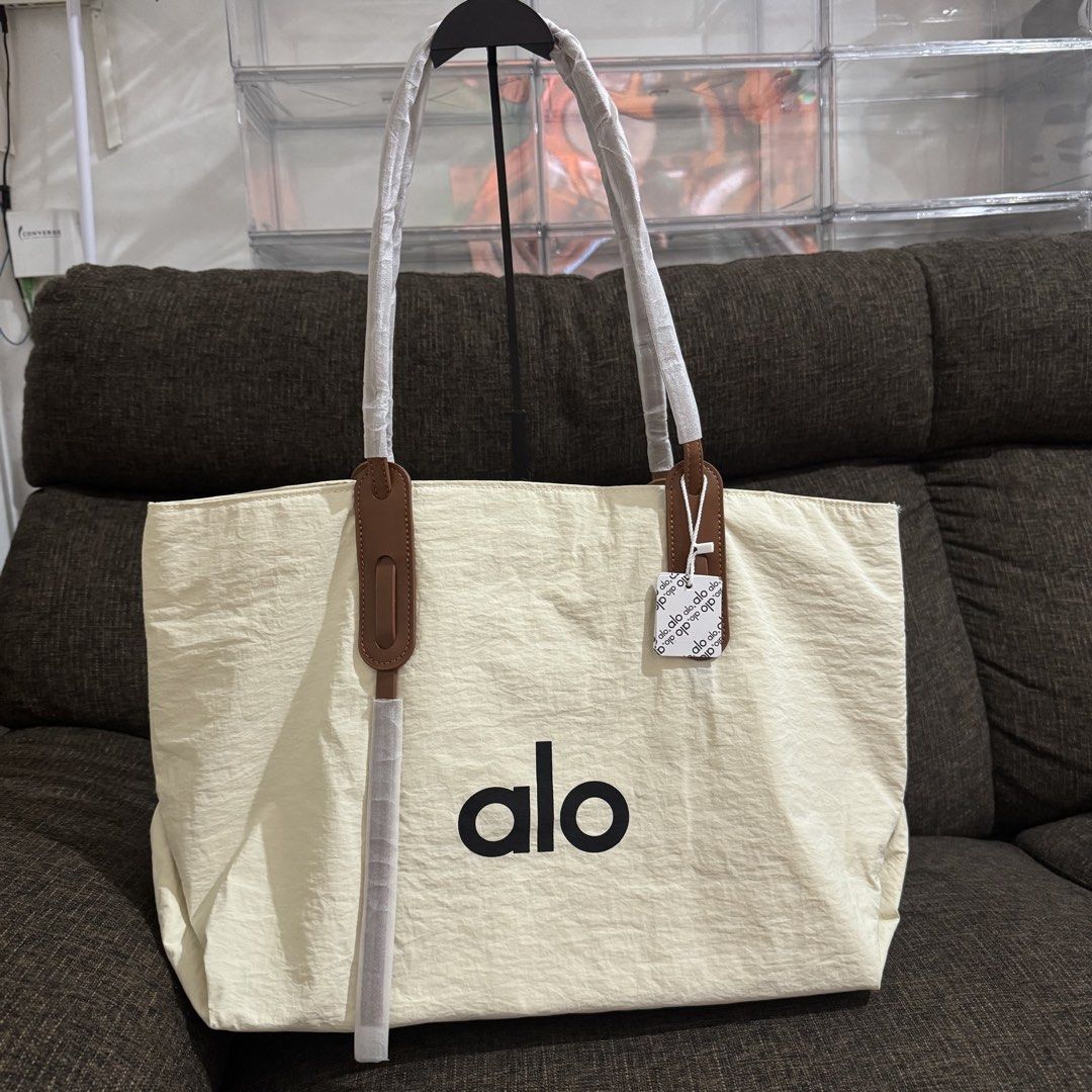 ALO Yoga Azenith Tote (Category: Tote Bags) located in Bulacan. Submitted by mykakarizza (Listing ID 1461214814, Image 1). Description: All colors restock✨✨ ₱550 only A//L//O Yoga Azenith Tote Size:48x32x19 cm Add paperbag 100 📸 Actual pics! 🙋🏻‍♀️ ─── ✦ ─── ✦ ─── ✦ ─── ✦ ─── 🛍️ LOOKING FOR MORE RESELLERS 🛍️ ✨ Buy 3 pcs of ANY items — FREE SHIPPING NA!🚚 ✨ Buy 10 items → FREE SF + ₱50 OFF EACH! 💖 PM us for 30 pcs & up WS 🤍 .