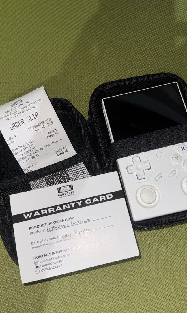 Anbernic RG35XXPro Handheld Game Console White (Category: Others) located in Pasig City. Submitted by goodbuy_02 (Listing ID 1461317885, Image 2). Description: - Anbernic RG35XX Pro (White) - Original box, warranty card, and order slip included - Purchased on July 18, 2023 - Comes with a 64GB SD card - Ready for your retro gaming adventures!.