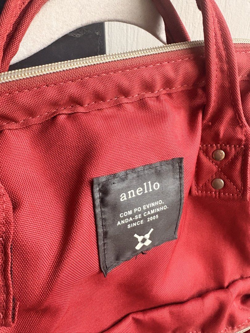 Anello Red Canvas Backpack (Category: Backpacks) located in Cainta. Submitted by declutteringprelovedbyzelle (Listing ID 1461238462, Image 2). Description: - Classic Red Anello backpack - Durable canvas material - Features a front zip pocket and side pockets - Equipped with top handles and adjustable shoulder straps - Offers plenty of space inside - Ideal for daily use or travel.