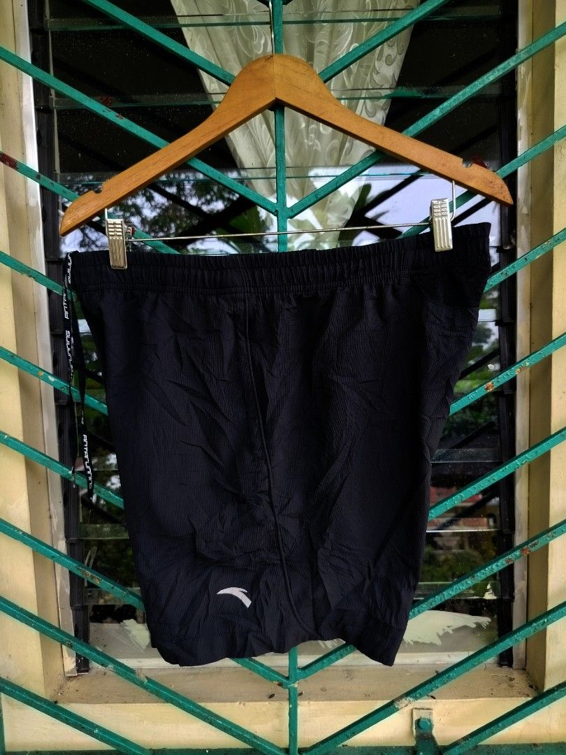 ANTA Running Shorts Black Size L (Category: Activewear) located in Manila. Submitted by virgiliosa38485 (Listing ID 1461192218, Image 1). Description: - Black ANTA running shorts -Size Large -Waist 32-40 - Elastic waistband with drawstring - Zippered side pocket - ANTA Running logo on drawstring - Size L (fits 170/80A) - Ideal for workouts and casual wear.