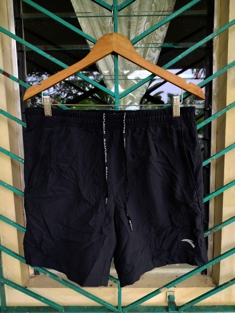 ANTA Running Shorts Black Size L (Category: Activewear) located in Manila. Submitted by virgiliosa38485 (Listing ID 1461192218, Image 2). Description: - Black ANTA running shorts -Size Large -Waist 32-40 - Elastic waistband with drawstring - Zippered side pocket - ANTA Running logo on drawstring - Size L (fits 170/80A) - Ideal for workouts and casual wear.