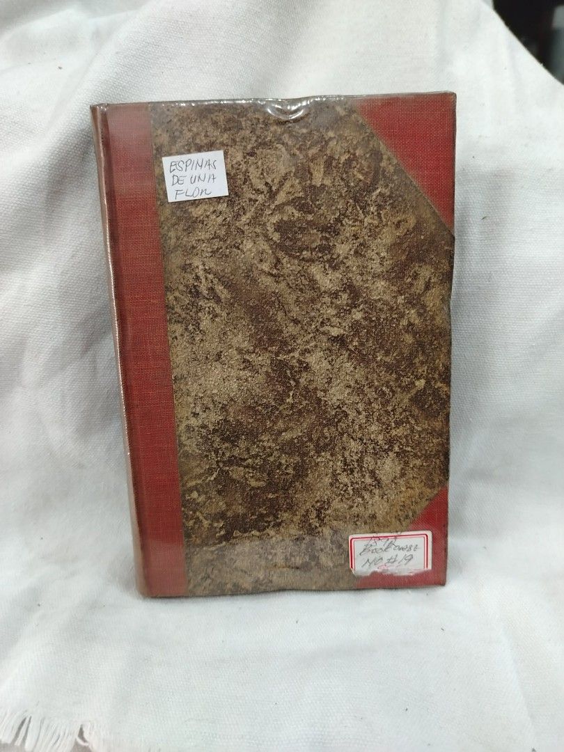 Antique Book Espinas De Una Flor (Category: Assessment Books) located in Quezon City. Submitted by warmgem.dde5c0 (Listing ID 1461140388, Image 1). Description: - Antique book titled "Espinas De Una Flor" - Novel by Don Manuel Angelón - Quinta Edición (Fifth Edition) - Published in Barcelona, 1892 - Features vintage aesthetic with aged pages and cover - Ideal for collectors and history enthusiasts.